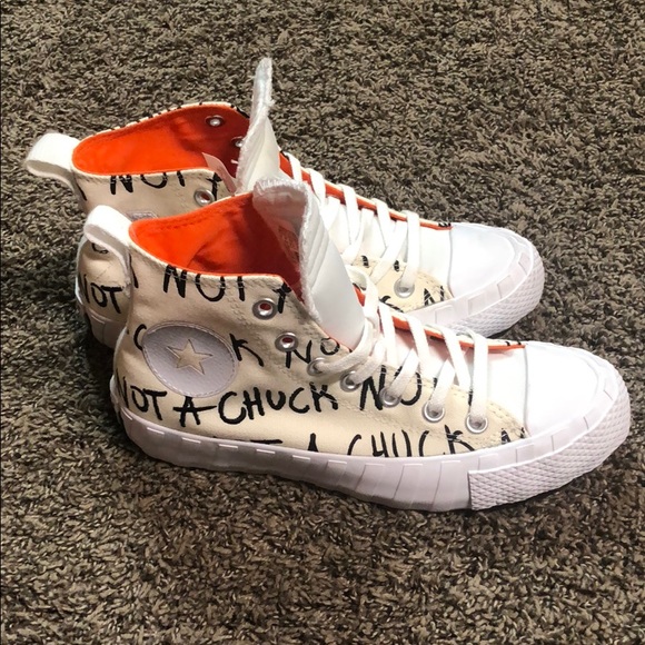 black converse off white